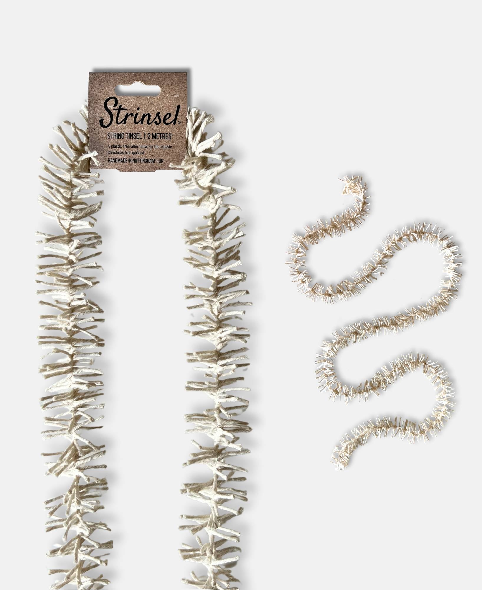 Decorative Strinsel string tinsel garland with and without packaging on a white background