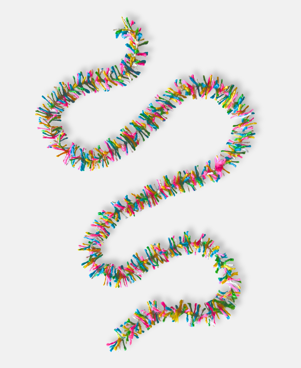 Neon Pop Strinsel jute string tinsel on a pale grey background