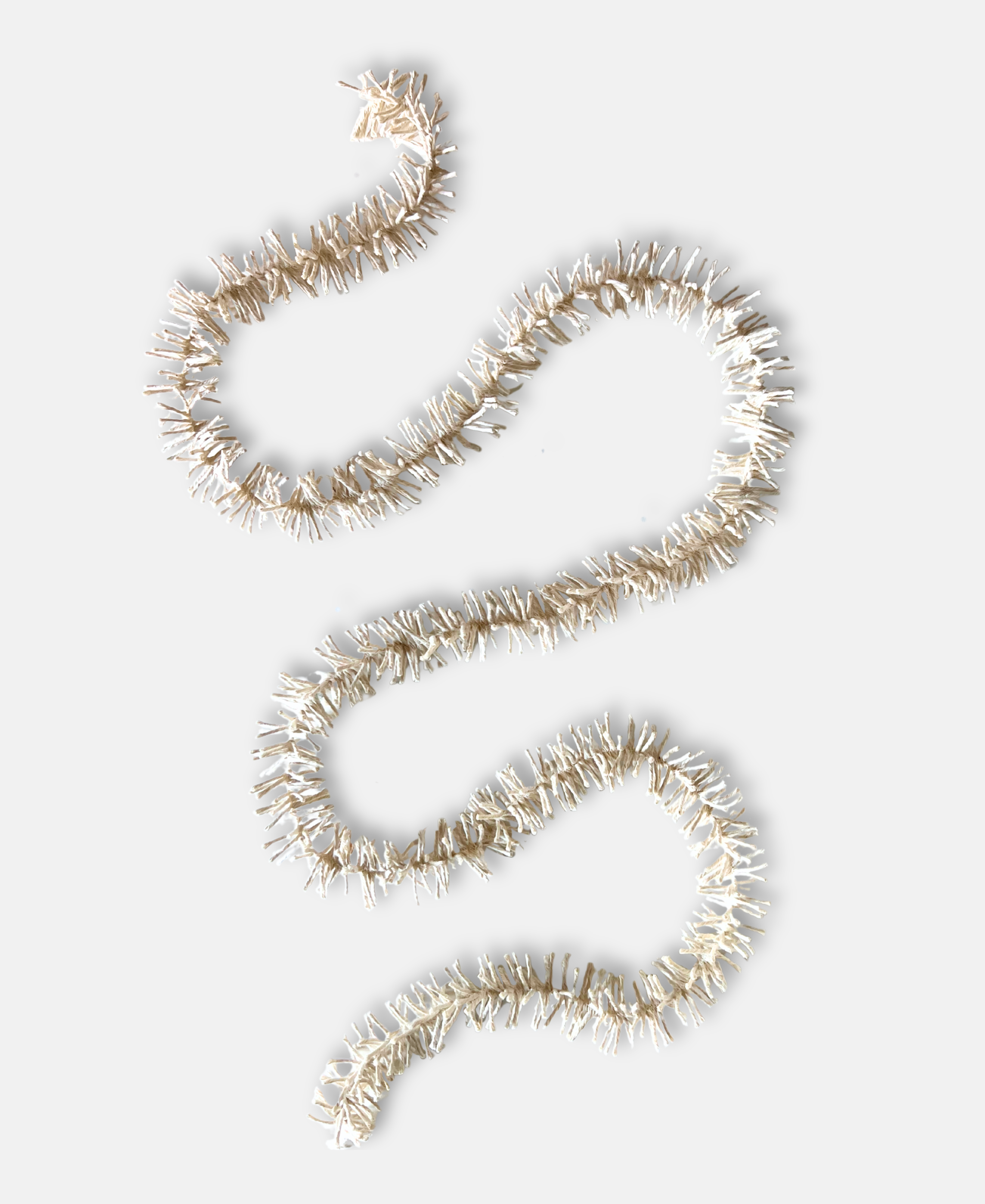 Decorative Strinsel string tinsel garland on a white background